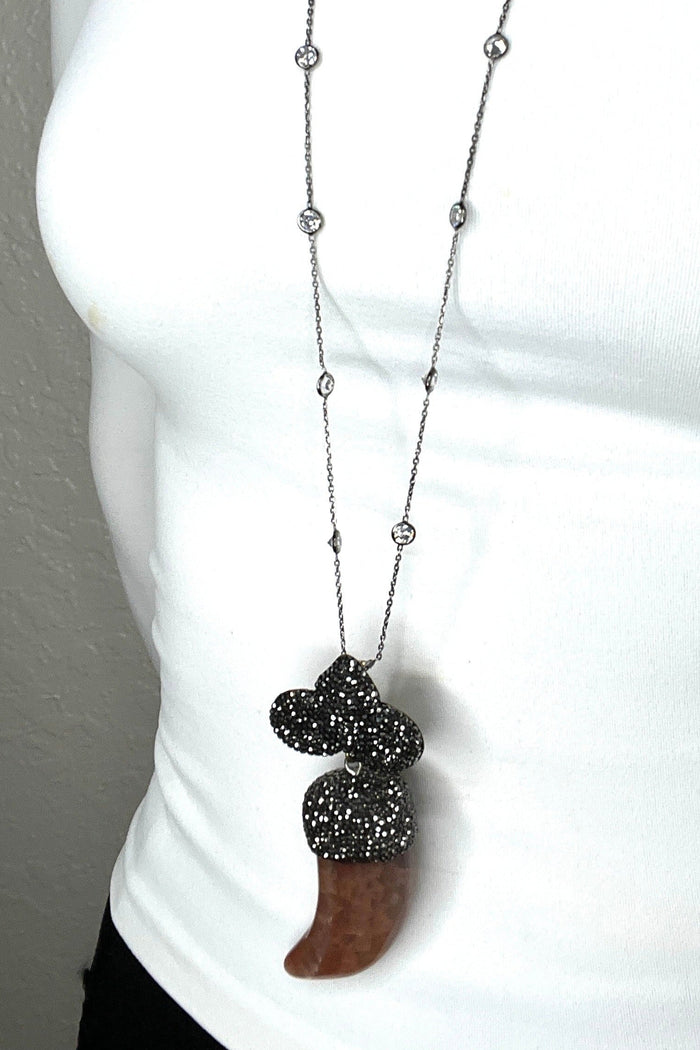 Style the Amber Horn Crystal Pendant exclusively at Born To Glam