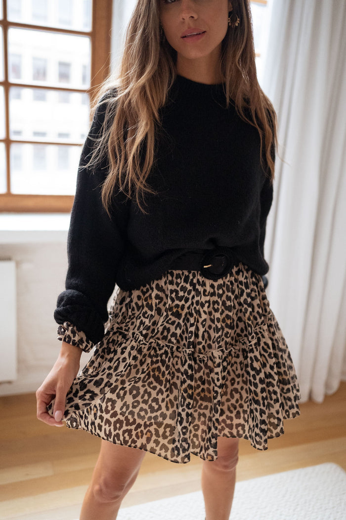 Black knit sweater side view