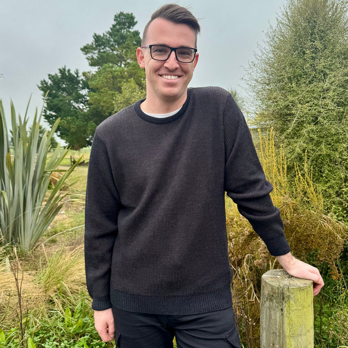 Man wearing Silverdale - Merino Men's Rib Crew Sweater (Sale) (4880-C-SILVERDALE) in Charcoal.