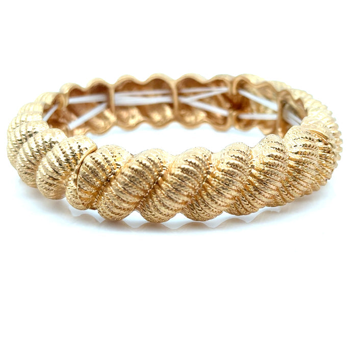 Style the Twisted Gold Stretch Bracelet exclusively at Born To Glam