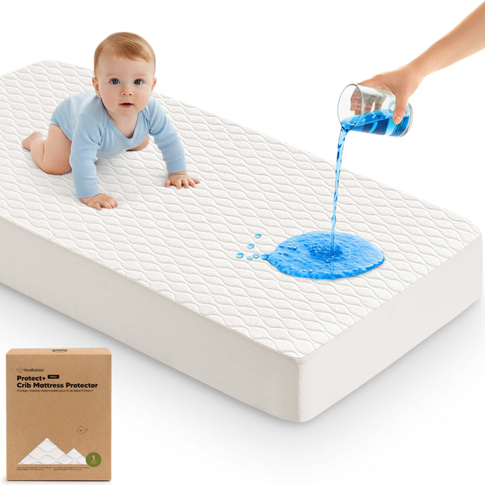 Waterproof crib mattress protector preventing spills and leaks for dry, protected baby sleep.