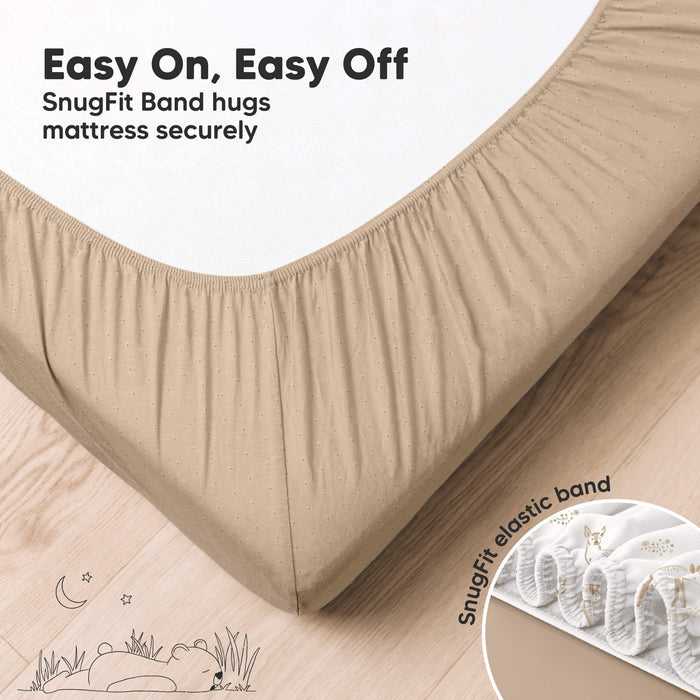 Easy-on fitted crib sheet with SnugFit elastic band for a secure mattress fit
