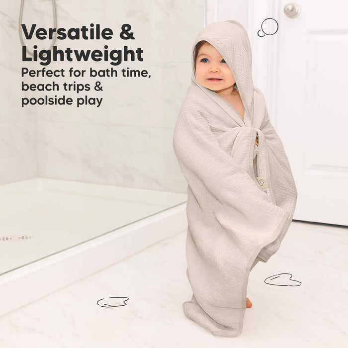 Versatile and lightweight hooded towel perfect for bath time, beach trips, and poolside play.
