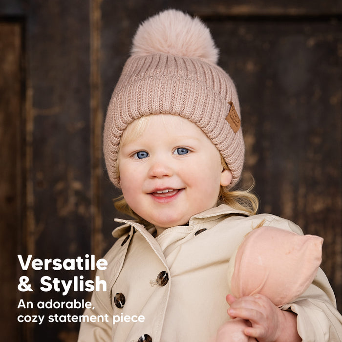Versatile and stylish knit beanie that adds an adorable cozy touch to any outfit.