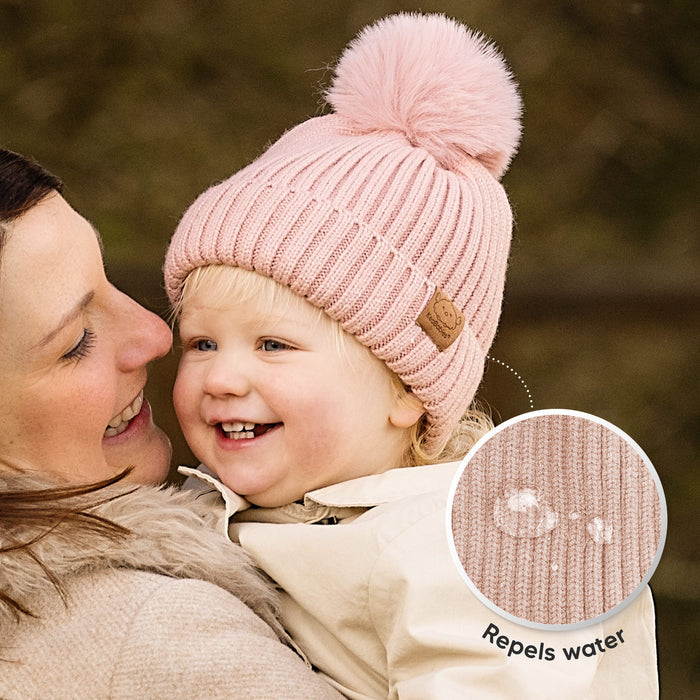 Water-repellent knit fabric helps protect baby from light moisture.