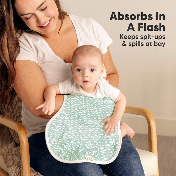 Absorbs In A Flash 
Keeps spit-ups & spills at bay