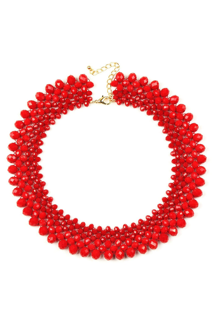 Red faceted glass crystal collar statement necklace with clustered stones and a gold-tone adjustable chain.