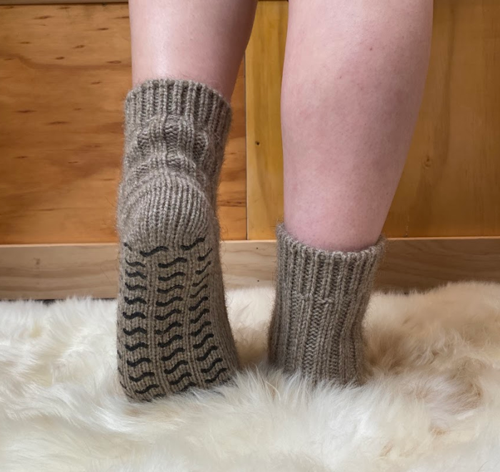 Pair of Natural Merino and Possum wool socks on feet.