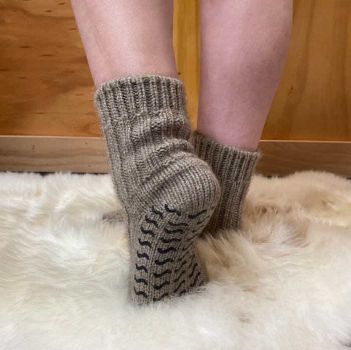 Merino and Possum wool socks on feet.