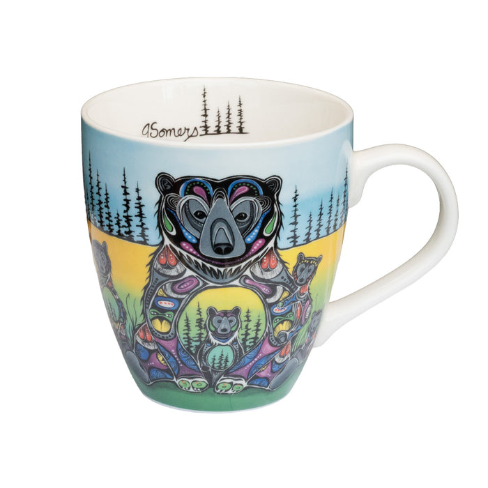 Colorful mug with bear design and 'Somers' branding on a white background