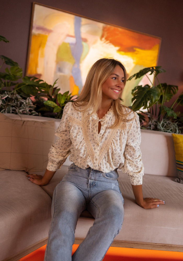 Beige floral Brida shirt showing ruffle collar and lace trim
