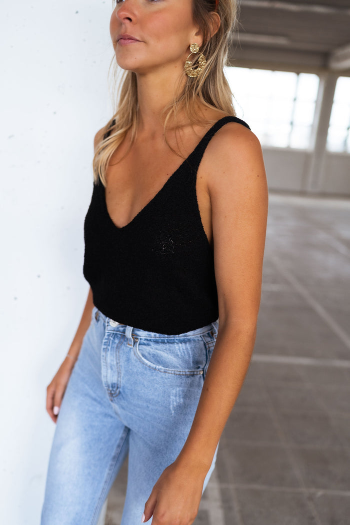 Model wearing black Neda cami top