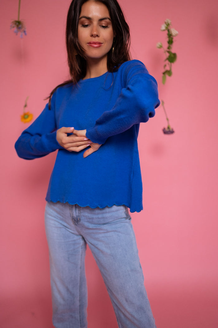 Blue Bess round-neck knit sweater detail