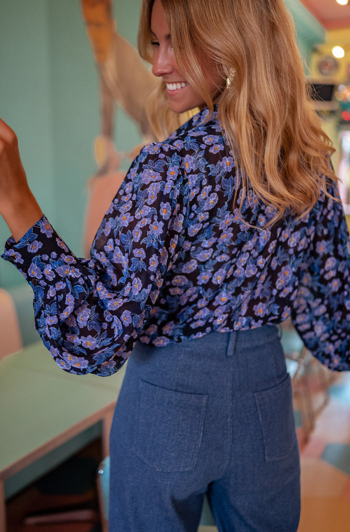Blue Marfa shirt showing floral print and collar
