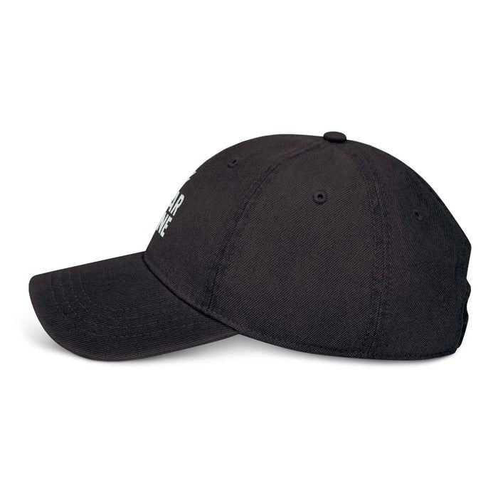 Fear None denim cap shown in an everyday styling view, highlighting embroidered wording, curved visor, and casual cap shapes.