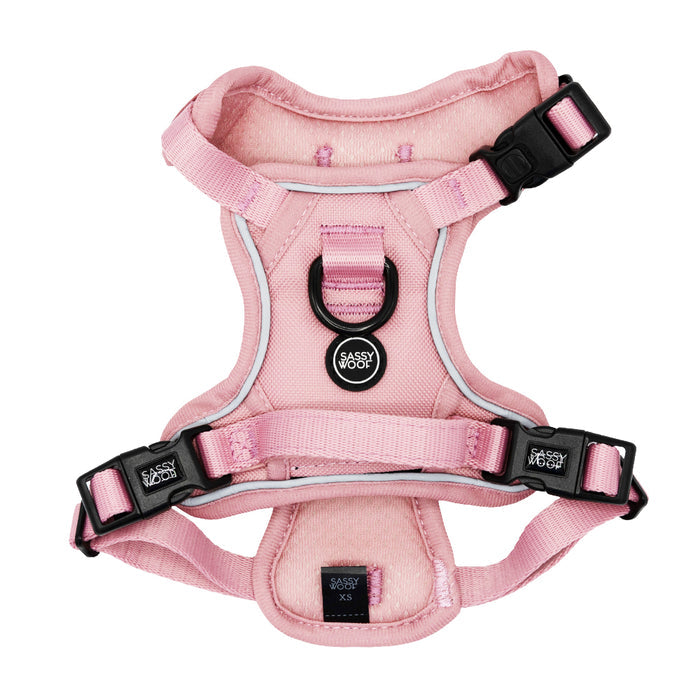 The Sassy Woof Dog Step-in Harness - Dusty Rose features black plastic buckles, reflective trim, and a central metal leash ring. Designed for extra small dogs.