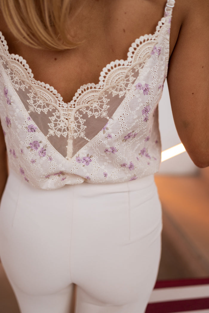 Model wearing ecru and purple floral Auda cami