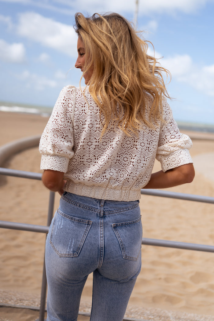 Model wearing ecru Safia blouse