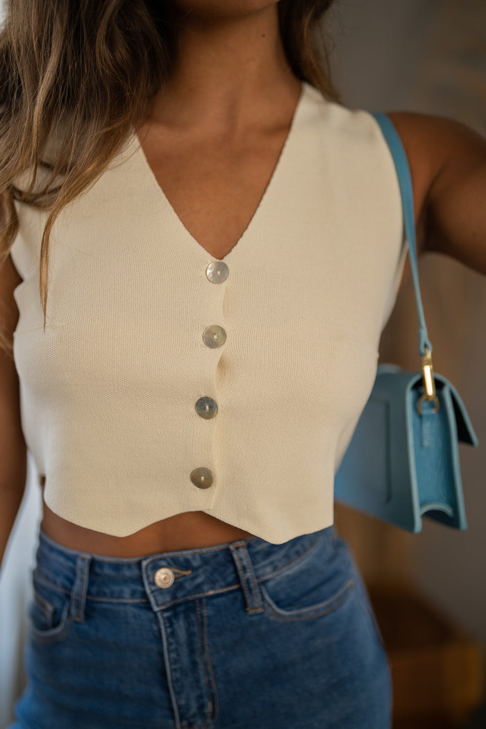 Ecru Lorena vest top showing V-neck and buttons