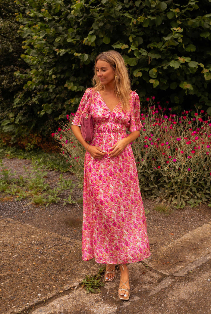 Pink floral maxi dress with flutter sleeves, full view