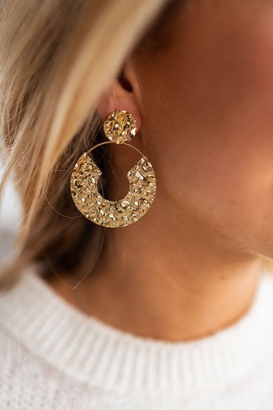 Golden Saga hammered hoop drop earrings worn