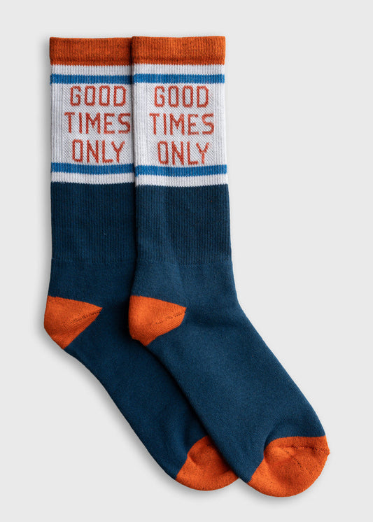 Blue and orange socks with "Good Times Only" text, featuring bold colors and playful design on a plain background.