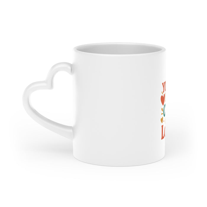 Heart shaped coffee mug with glossy Duraglaze coating, vibrant print and romantic handle detail for home or office drinkware.