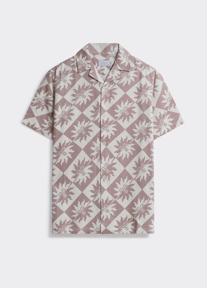 The Percival Hot Shirt in dusty pink and off-white, featuring a sun motif check pattern and a camp collar, shown flat.