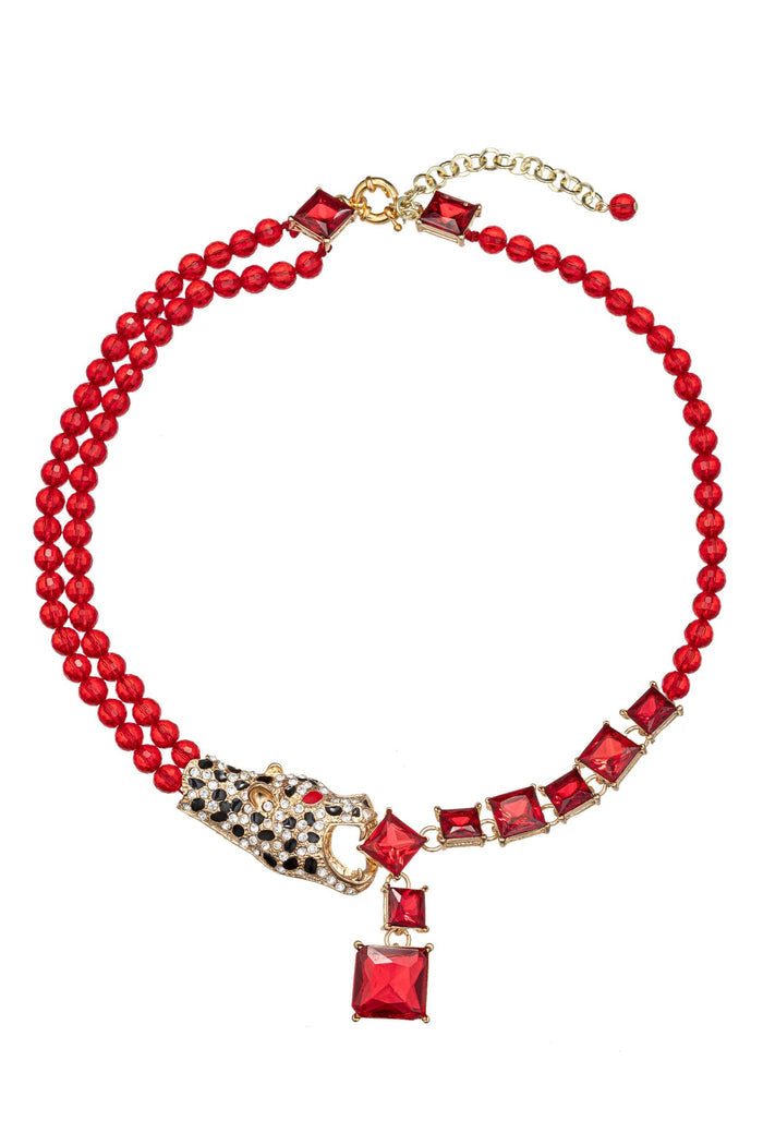 Red beaded statement necklace with leopard-inspired animal motif, crystal accents, and gold tone details.