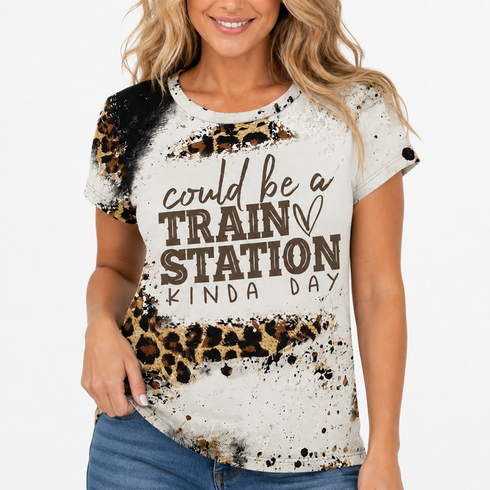 Leopard print graphic tee women outfit idea with black bottoms, ankle boots, and clean styling appeal for chic daywear today.