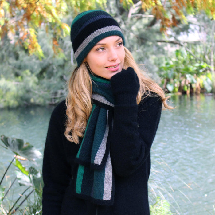 Woman wearing tempo scarf in colour Tasman
