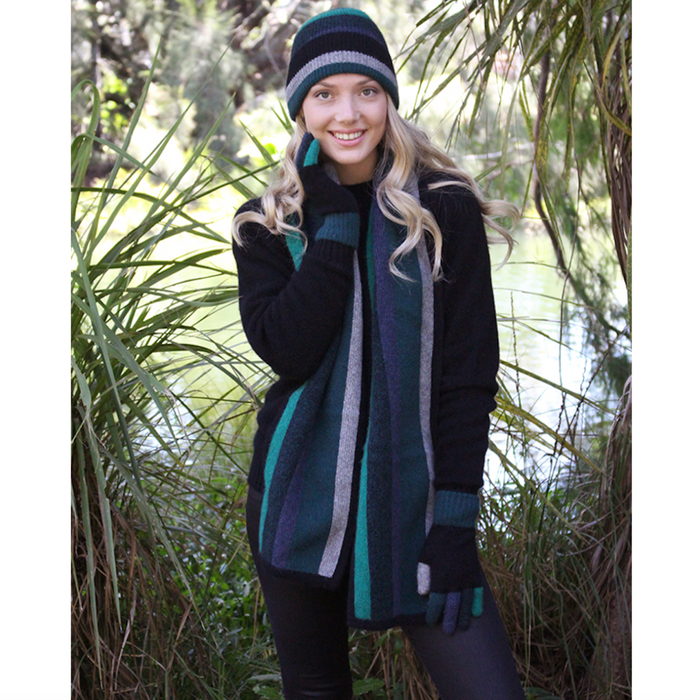 Woman wearing tempo scarf in colour Tasman