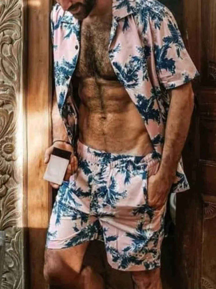 Men's Hawaiian outfit set in pink tropical print with matching shirt and shorts, product image 1 for comparison online today.
