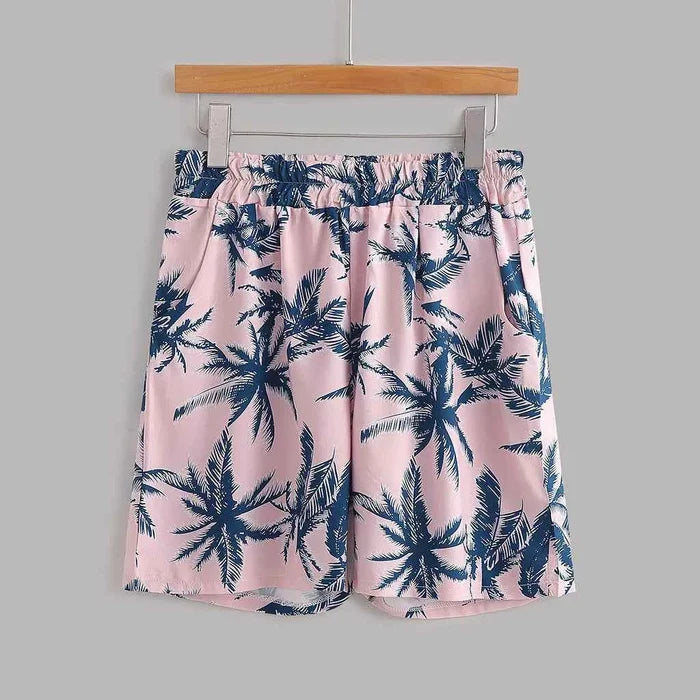 Men's Hawaiian outfit set in pink tropical print with matching shirt and shorts, product image 4 for comparison online today.