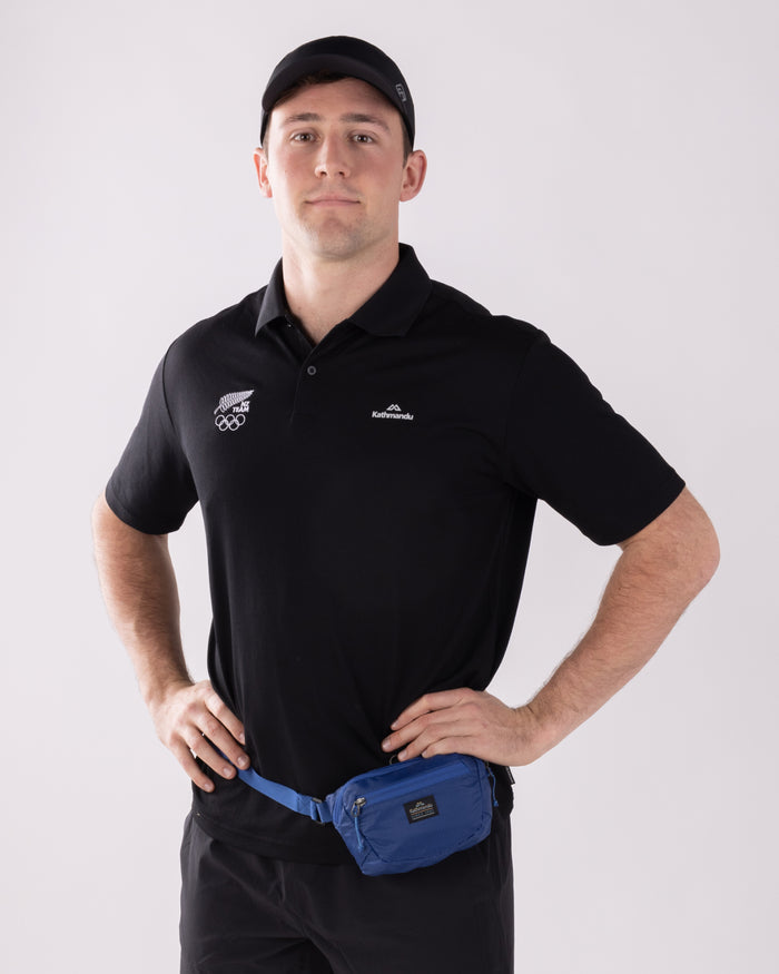 B2320_OZ7_NZOC_Range_Mns_Vanua_Polo_v3_NZ_Team_Black_a_1756683817000