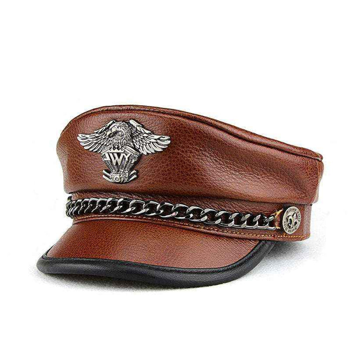 Brown leather cap with metal chain and emblem on a white background
