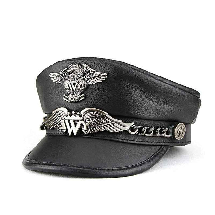 Black leather cap with metal emblem and chain on a white background