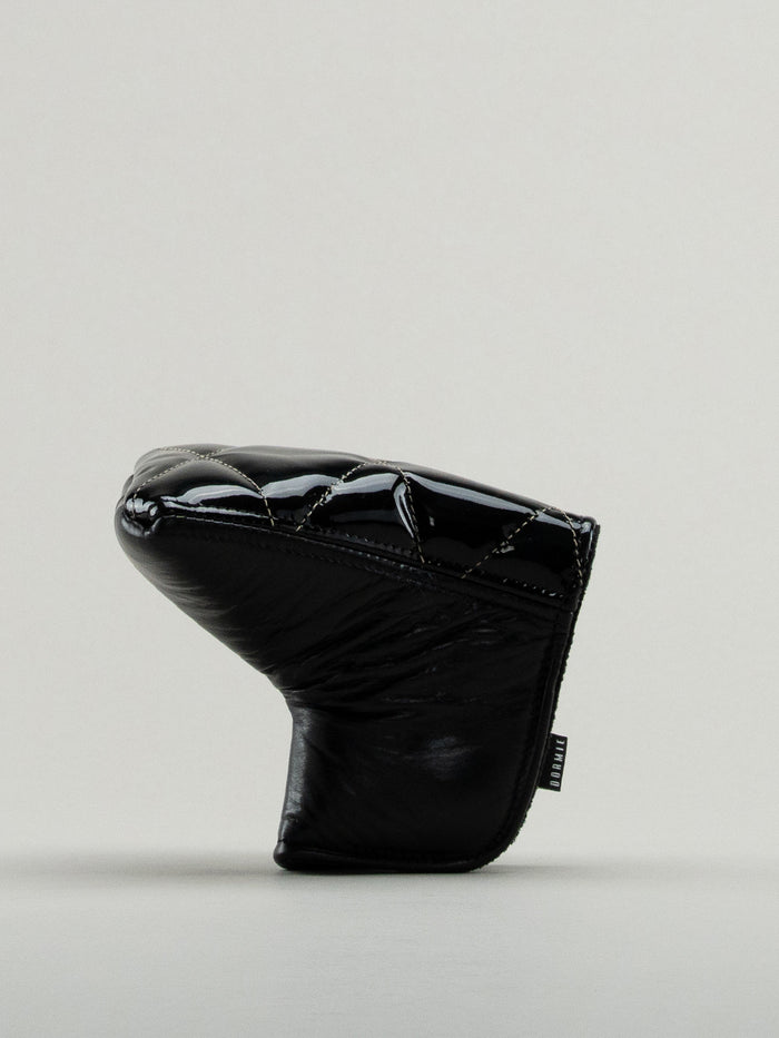 Black quilted leather golf headcover.