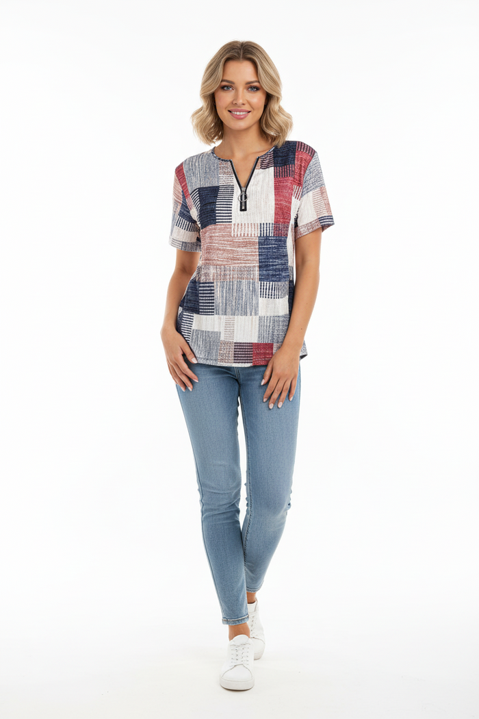 Plus size T shirt for women with zipper accent and geometric print shown in a clear product view for a clear view of the top.