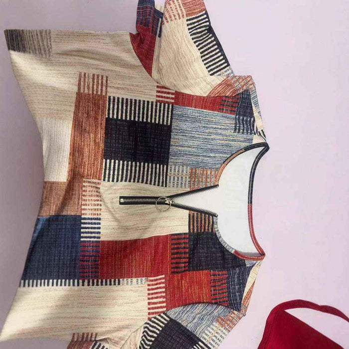 Women's plus size T shirt with geometric pattern and zipper detail shown for product review for an accurate product overview.