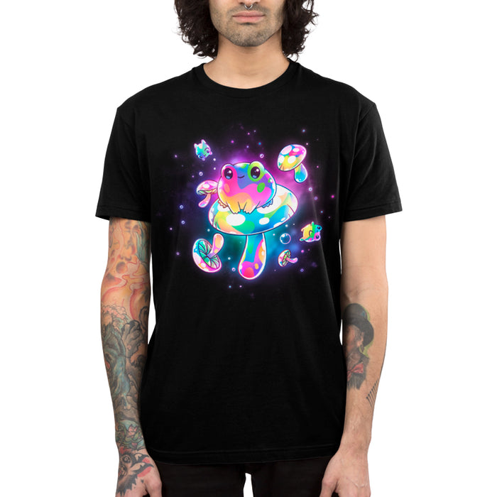 Premium Cotton T-shirt_TeeTurtle black Psychedelic Space Frogs apparel featuring a frog sitting on a giant mushroom surrounded by smaller frogs and mushrooms in vibrant, psychedelic colors floating in space.