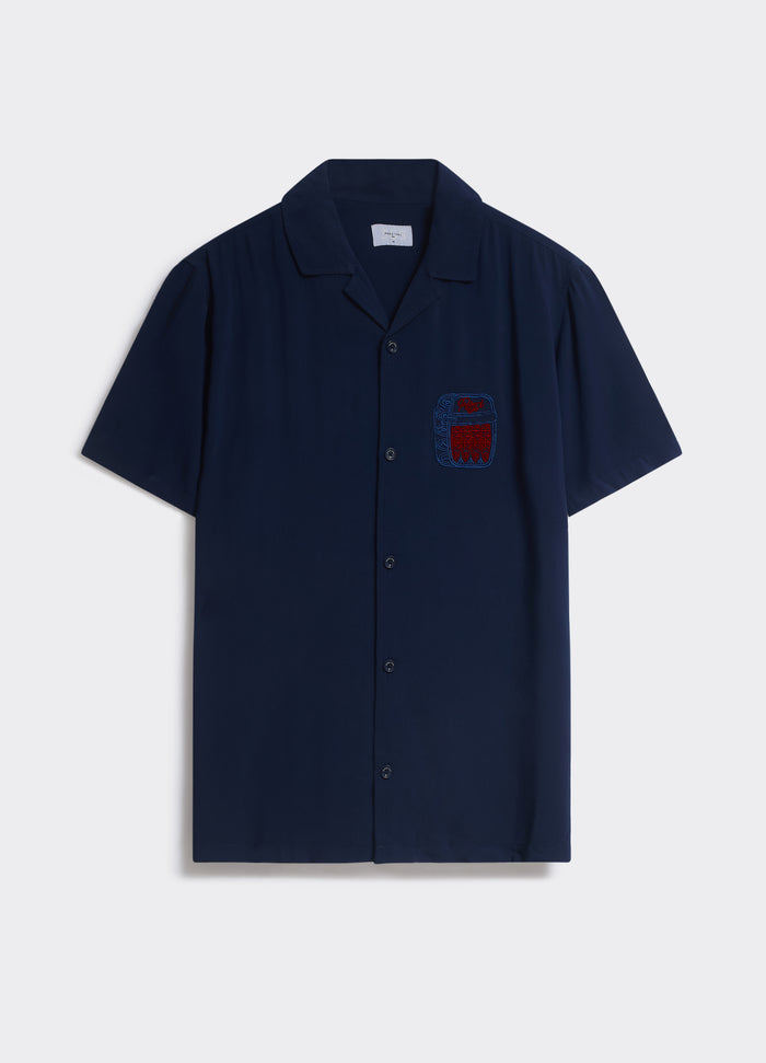The navy Percival Sardines Shirt, a short-sleeve camp collar style with chest embroidery, shown flat.