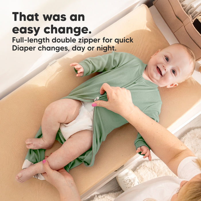That was an easy change. - Full-length double zipper for quick Diaper changes, day or night.