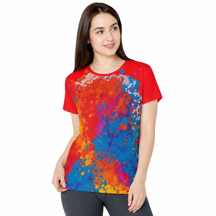 Red sports jersey for women with bright all-over paint print, short sleeves, crew neck, and cool fit activewear style for gym