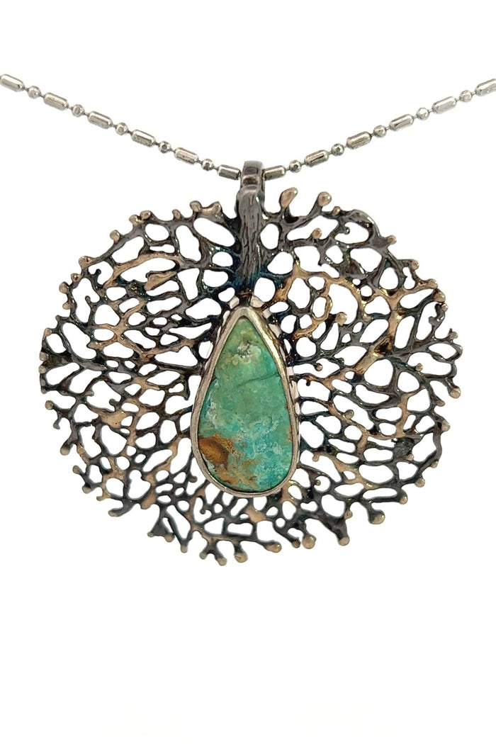 Style the Sterling Silver Turquoise Web Pendant exclusively at Born To Glam