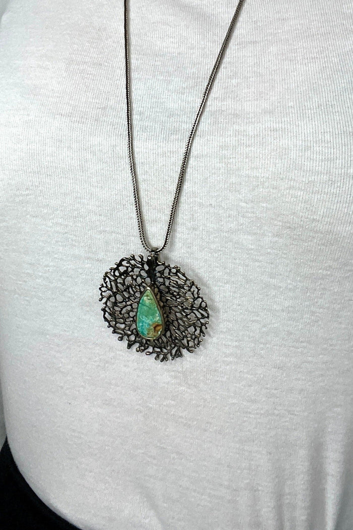 Style the Sterling Silver Turquoise Web Pendant exclusively at Born To Glam