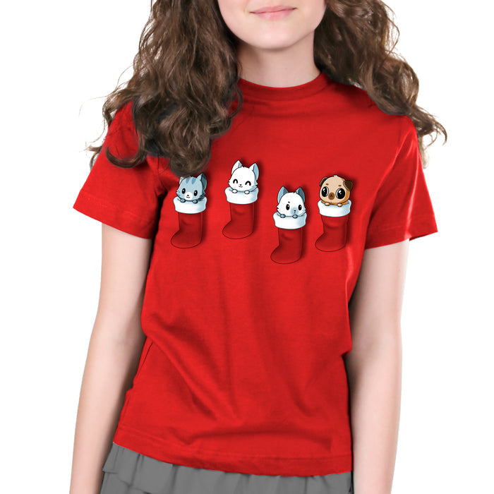 Premium Cotton T-shirt_TeeTurtle Stocking Stuffers red apparel featuring a group of three cats and pug puppy looking cute in Christmas stockings.