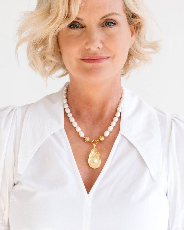 Model in the Susan Shaw Pearl Oyster Necklace with Gold Oyster and Freshwater Pearl