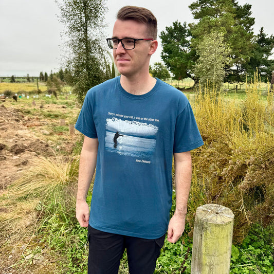 Man wearing tee in colour blue.