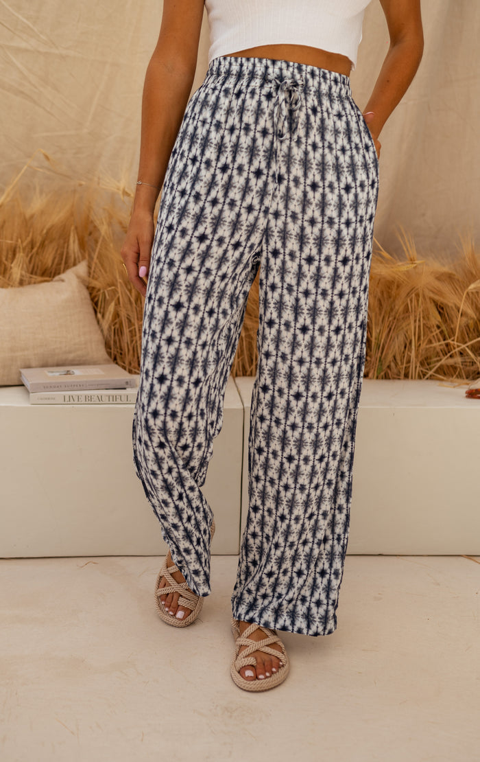 Model wearing tie dye Simona pants